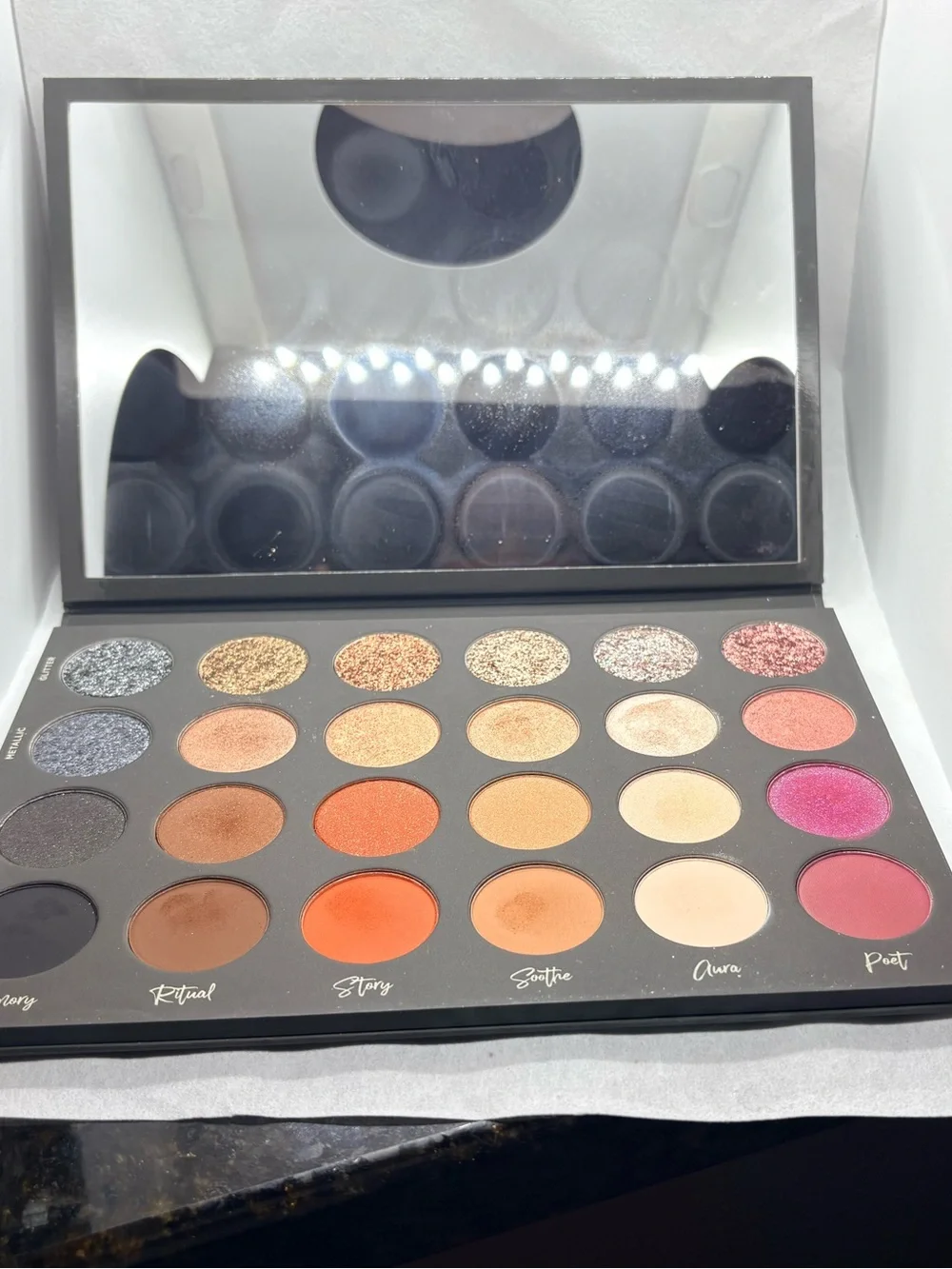 TATI BEAUTY Vol. 1 Eyeshadow Palette — Matte Black with Rose Gold Logo